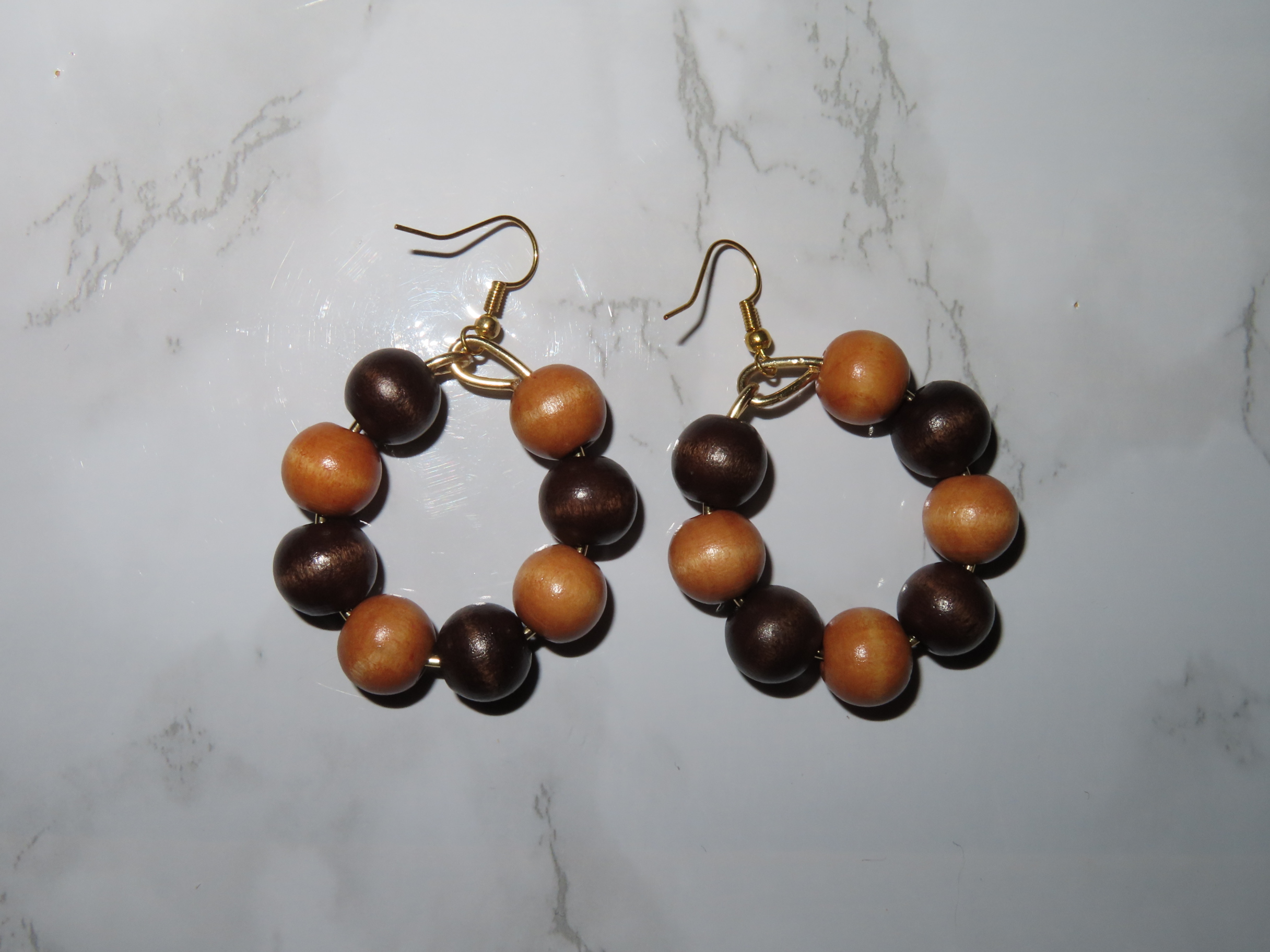 Circular wooden beaded earrings