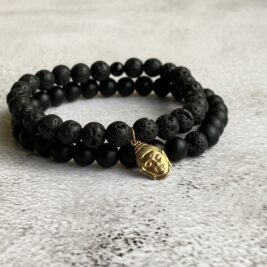 Black stone bracelet with gold Buddha charm