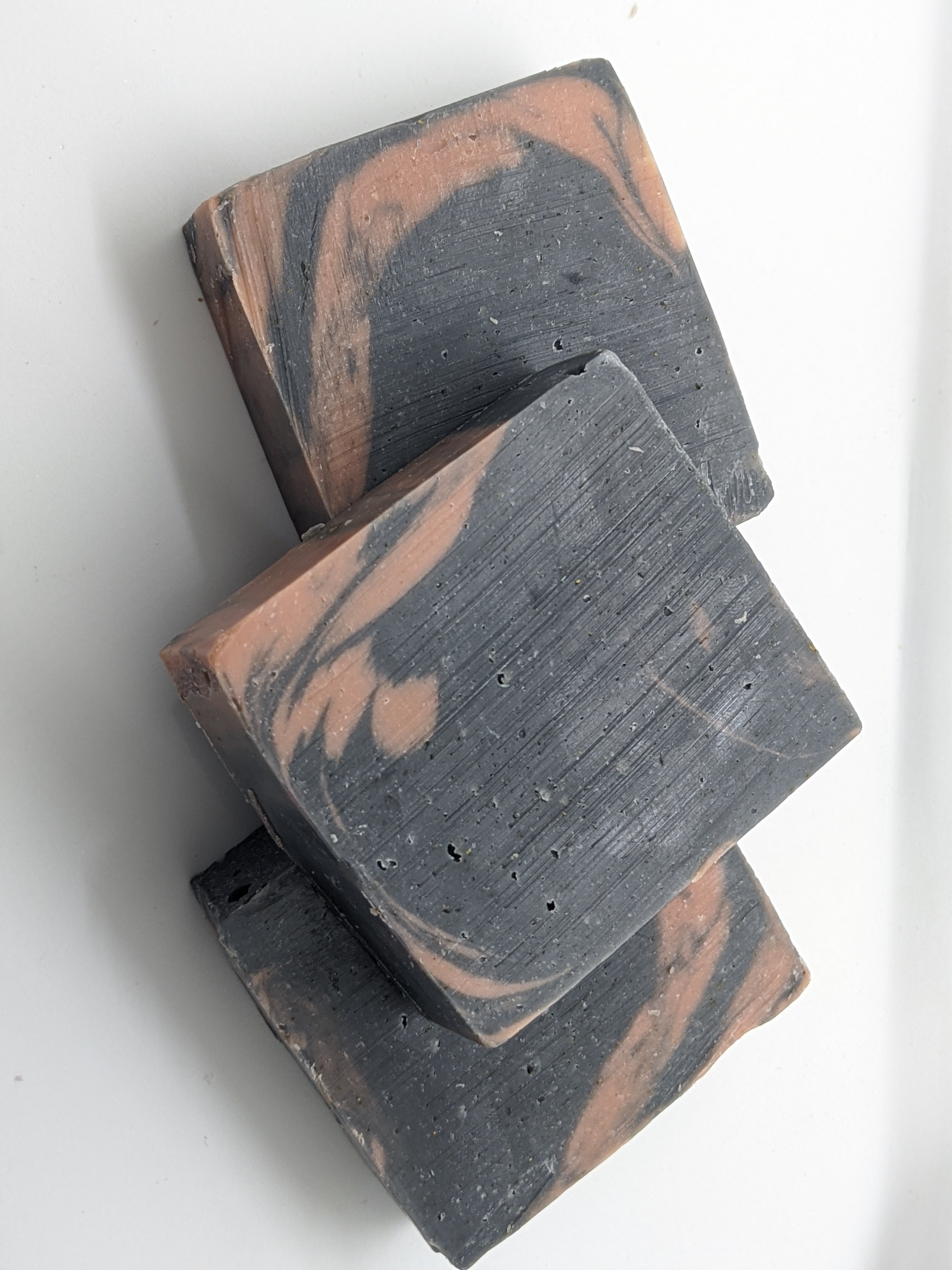 Made with activated charcoal and  organic calendula which has anti inflammatory properties and works wonders on eczema and organic chamomile which is known to help you relax as well as ease irritated skin. We've also added some Rose clay to gently coax excess oil out of your skin to help prevent clogged pores and promote skin health. It's gently cleanser and draws out impurities while moisturizing  If you have an allergic reaction please contact us and discontinue usage of product.