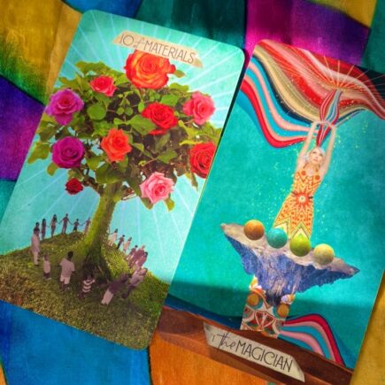 Image of a card with a flowering tree and a card with a magician illustration. Blue, yellow, red, green.