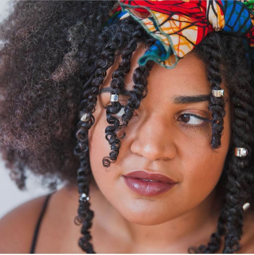 Black Femme with natural hair wearing LocRings