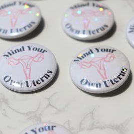 Mind Your Own Uterus Metal Pinback Buttons 1.50"