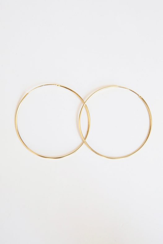 14k Amor Deus Gold Classic Hoop Earrings. Solid hoop with an inset and hinge combination closure for a sleek look.  Large Size