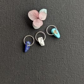 three jump rings with semiprecious stones