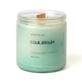 16oz handcrafted soy candle with a wooden wick in a clear glass jar, labeled “Equilibrium,” styled with neutral tones and soft lighting to evoke calm and balance.