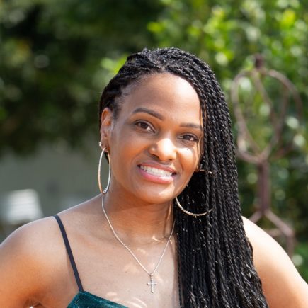 A Black Woman facing eviction, behind on rent.