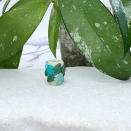 Teal Floral Glow in the Dark Clay Tube