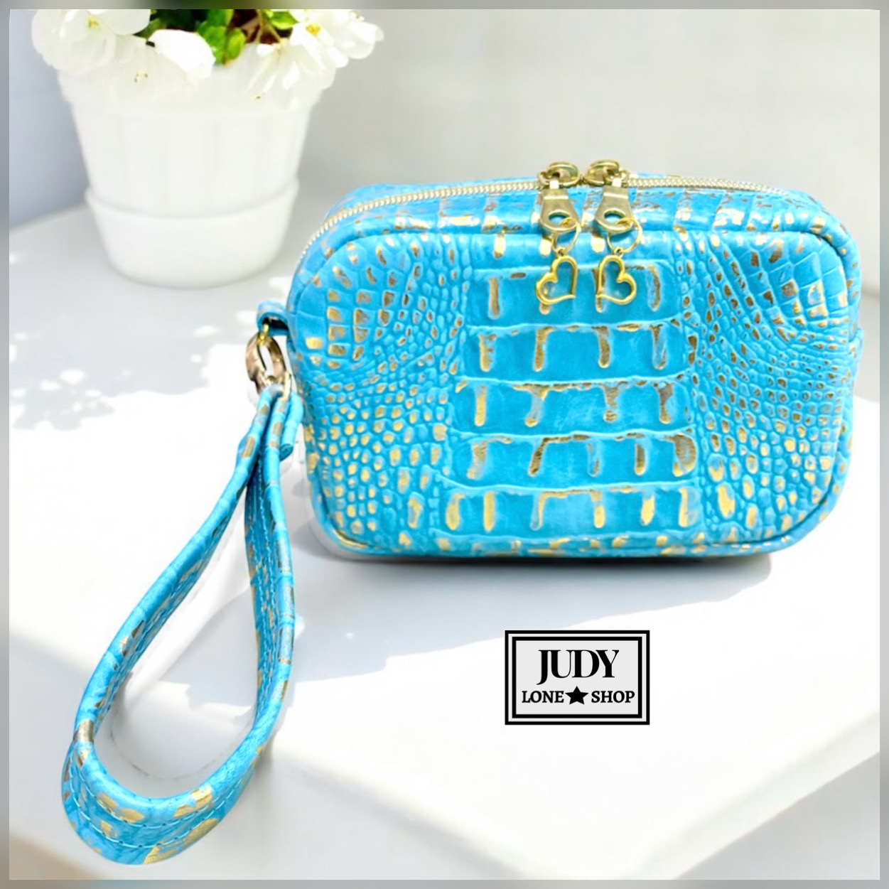 Metallic Embossed Leather Wristlet